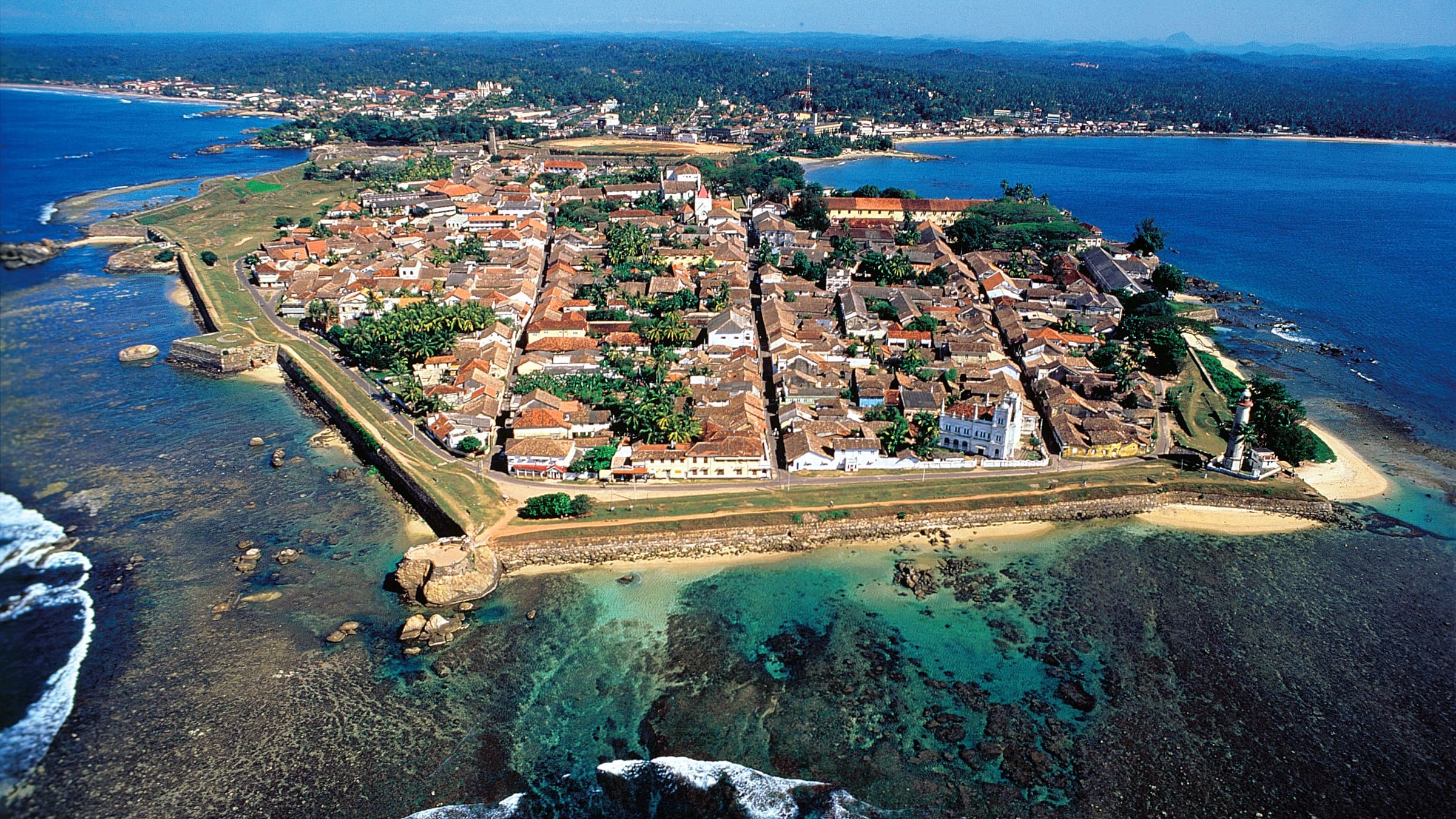 Galle Fort from the air, the walled peninsula and its grid of streets surrounded by sea.